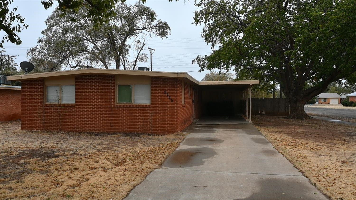 a house with trees in the background