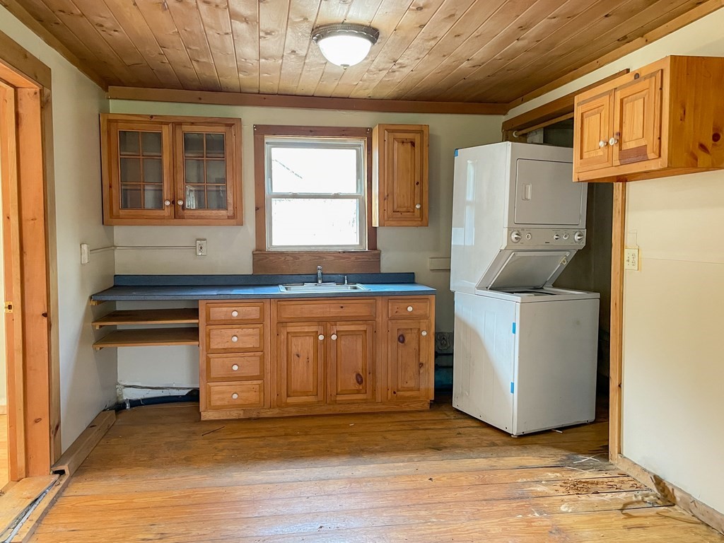 1430 Old Rte 9 Windsor, MA 01270 - Photo 4 of 14 a kitchen with granite countertop a refrigerator and cabinets