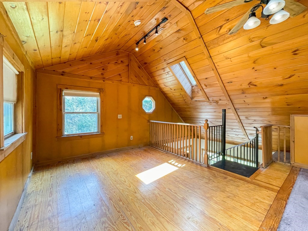 1430 Old Rte 9 Windsor, MA 01270 - Photo 10 of 14 a view of a hall with wooden floor and fence