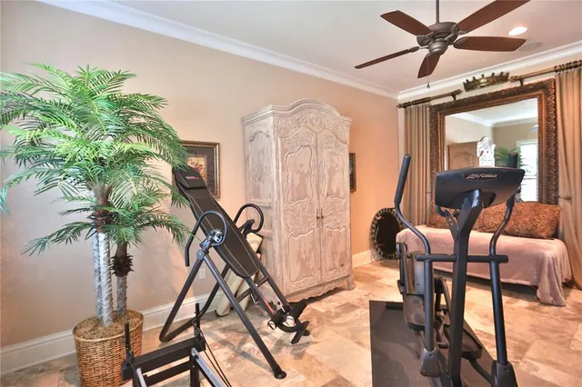 a spacious bathroom with a double vanity sink a mirror a bathtub and next to a window