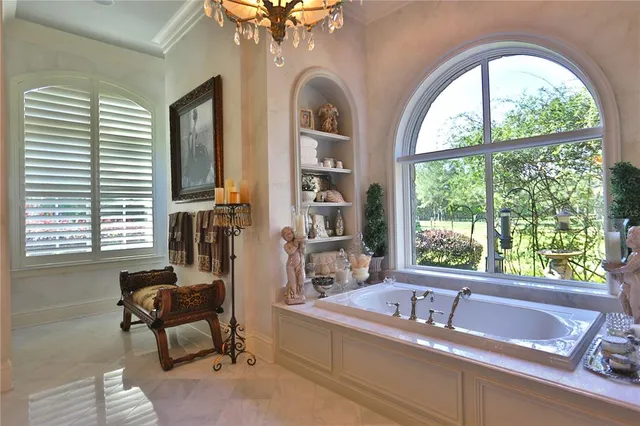 a view of a swimming pool with deck