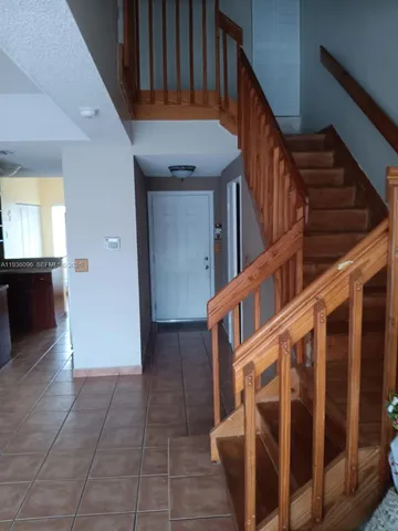 a view of empty room with windows