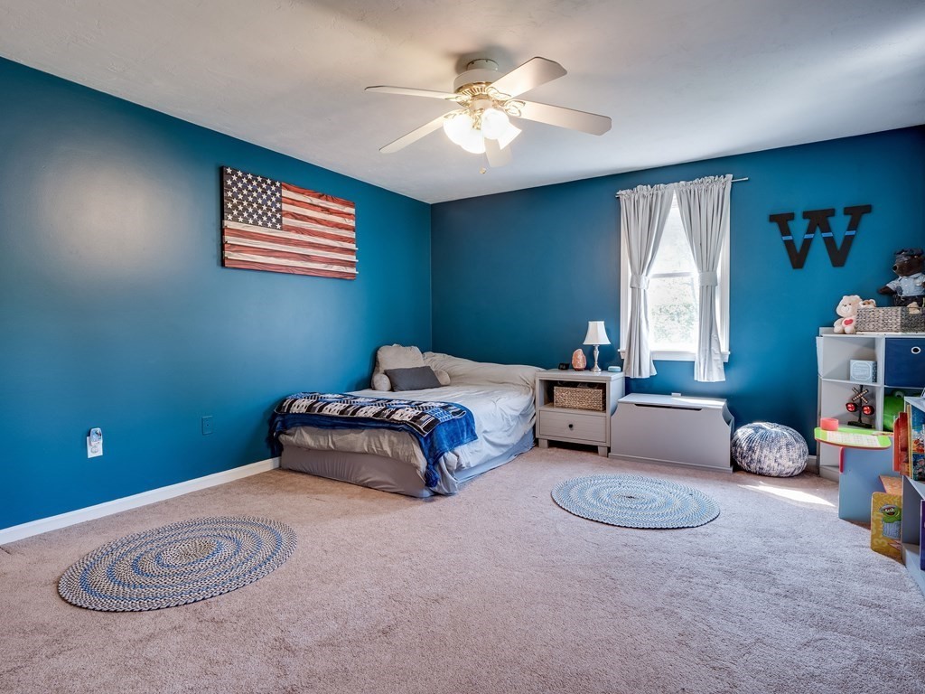 75 A Hazen Road Shirley, MA 01464 - Photo 24 of 42 a bedroom with bed and window