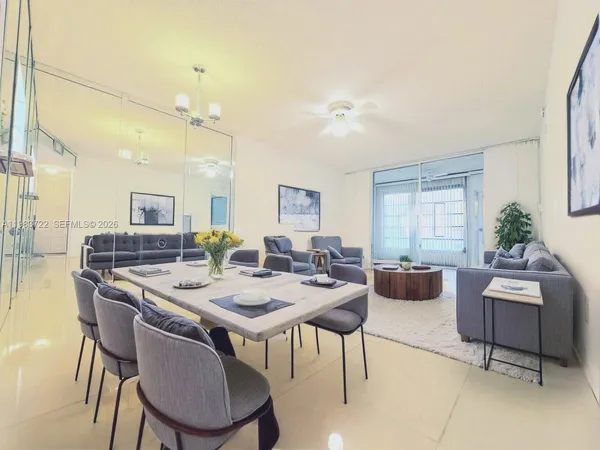 a view of a dining room with furniture