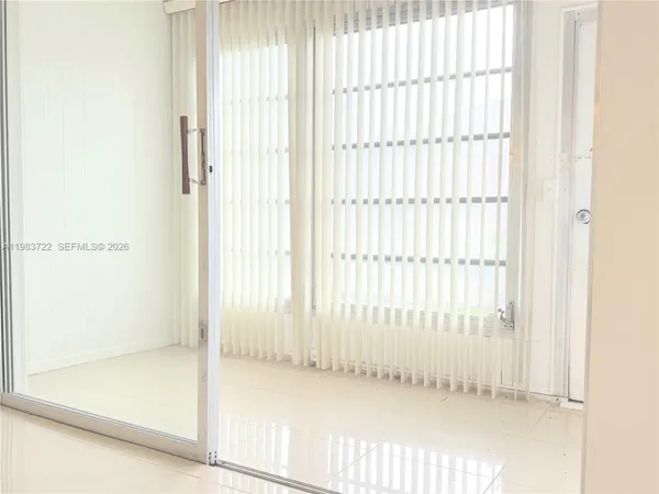 a view of a bathroom with a white door