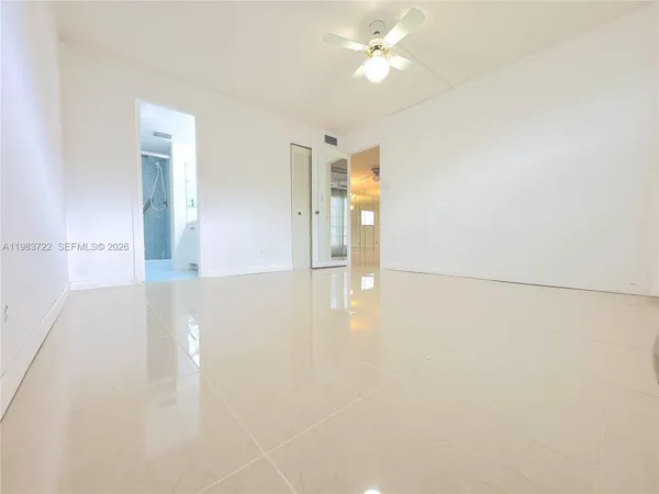 a view of a livingroom with wooden floor