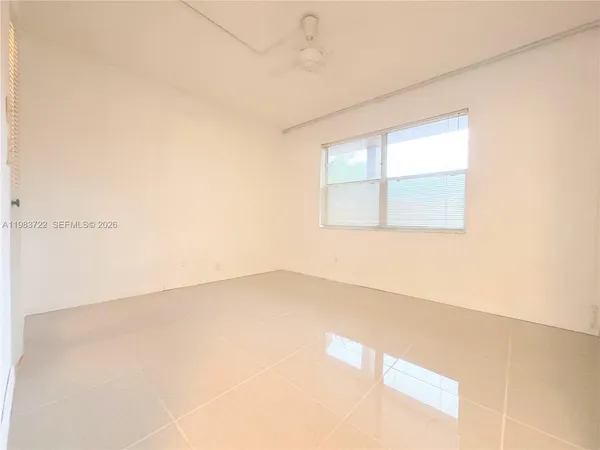 an empty room with a window