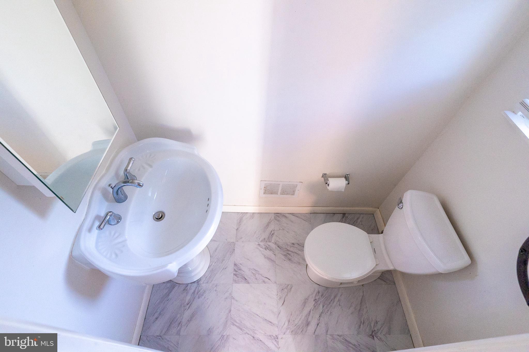 9801 Clanford Road Randallstown, MD 21133 - Photo 16 of 34 Main Level Half Bath