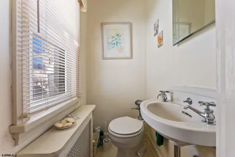 a bathroom with a sink and a toilet