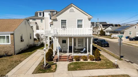 a front view of a house with yard