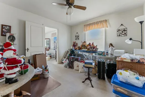 a room with gym equipment and a window