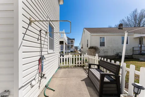 a view of a porch with wooden floor
