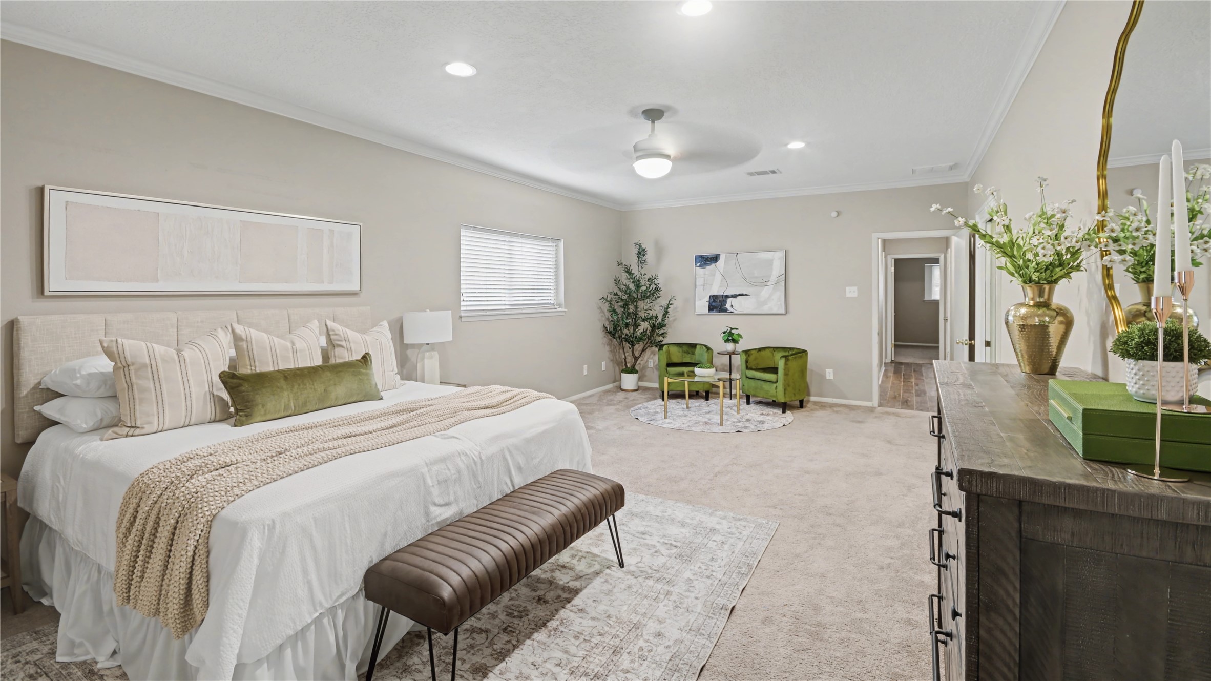 1431 Walnut Lane Houston, TX 77339 - Photo 13 of 44 Primary bedroom with an extended layout that includes a sitting area — offering a private space to unwind.