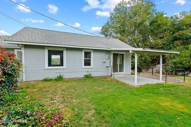 a house view with a garden space