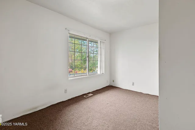 an empty room with a window