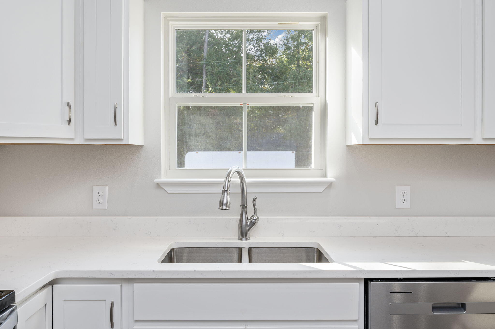 1000 Valley Road Crestview, FL 32539 - Photo 11 of 30 a kitchen with a sink and a window