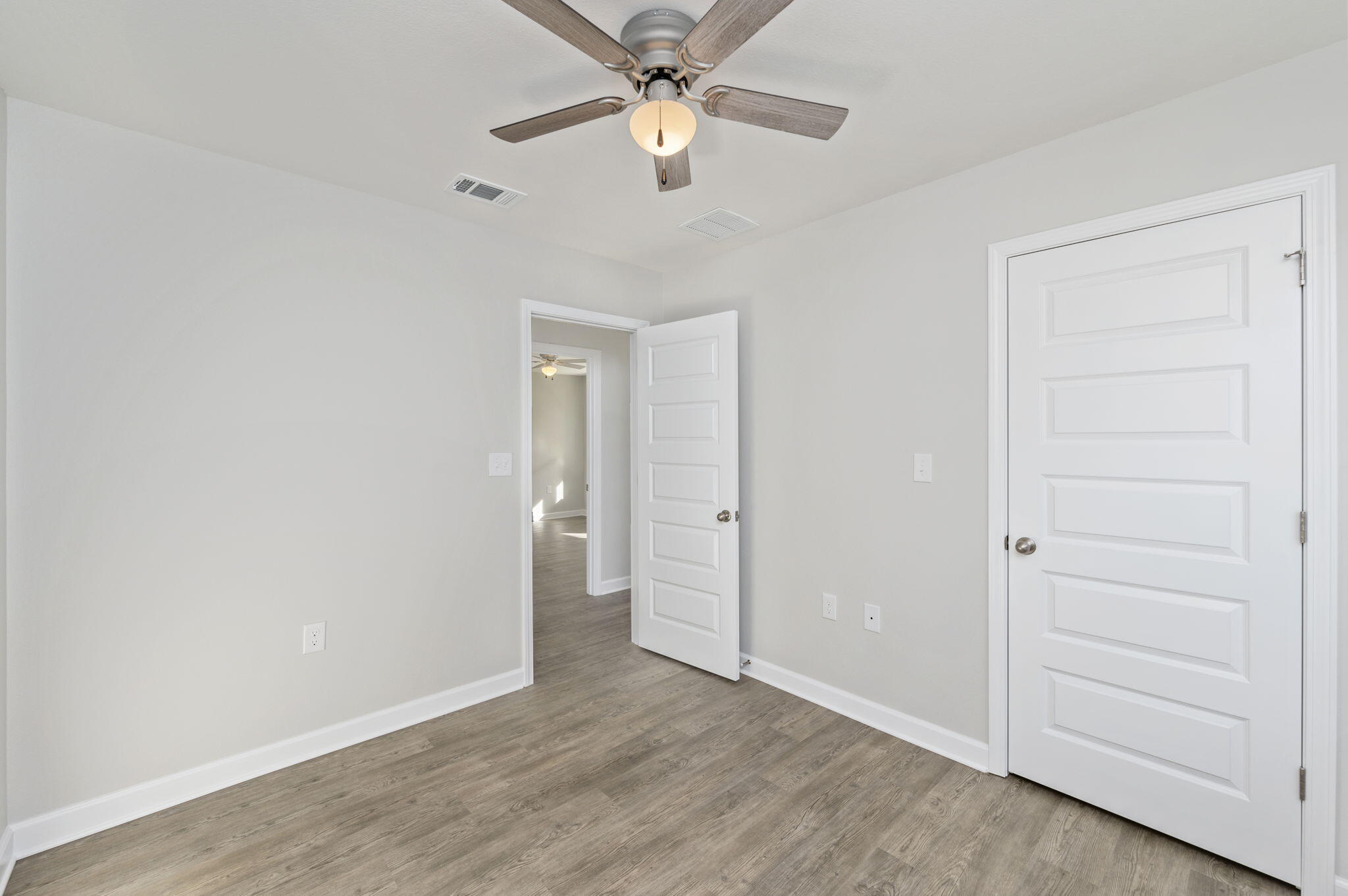 1000 Valley Road Crestview, FL 32539 - Photo 15 of 30 wooden floor in an empty room