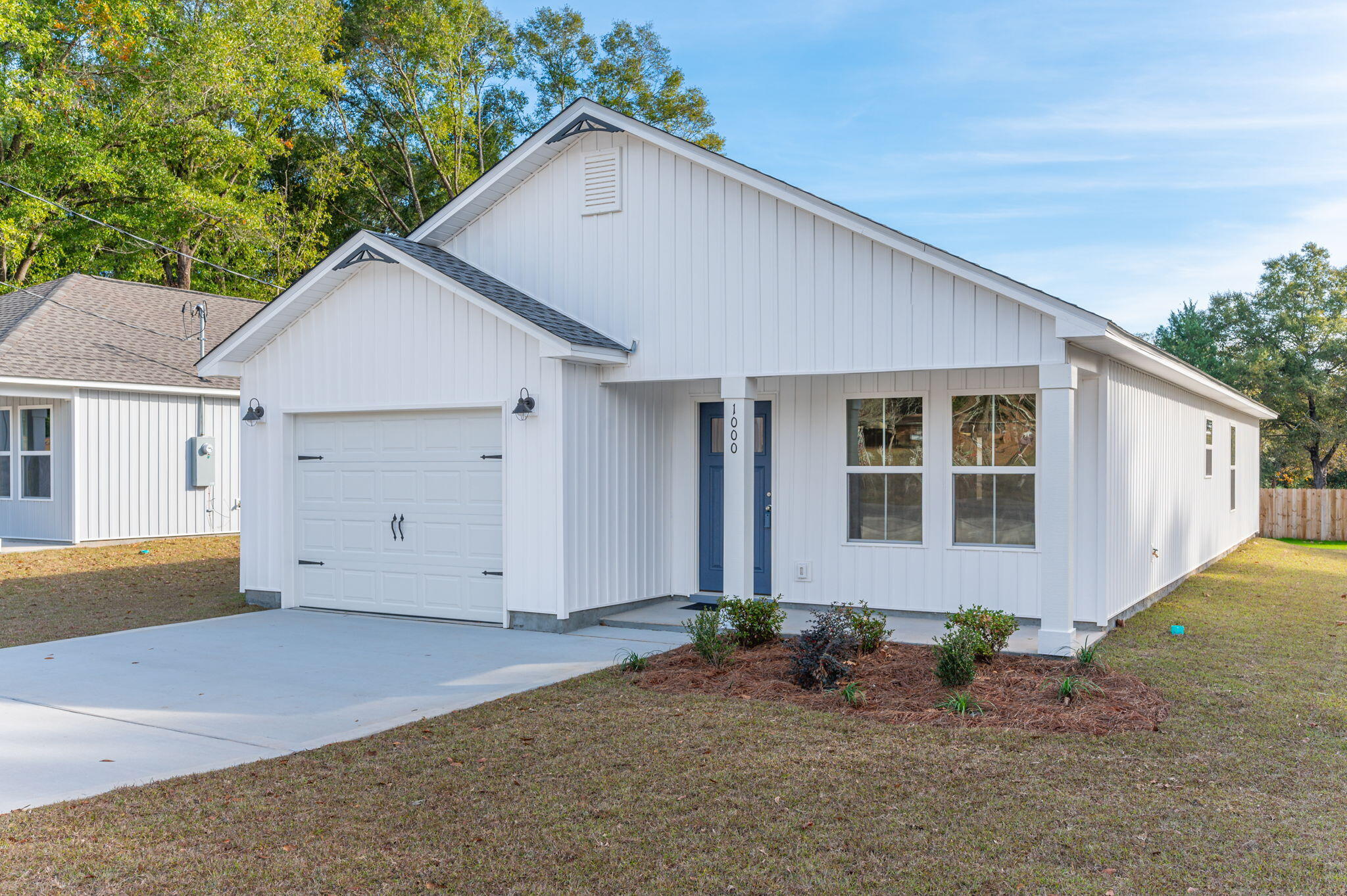 1000 Valley Road Crestview, FL 32539 - Photo 2 of 30 a front view of a house with garden