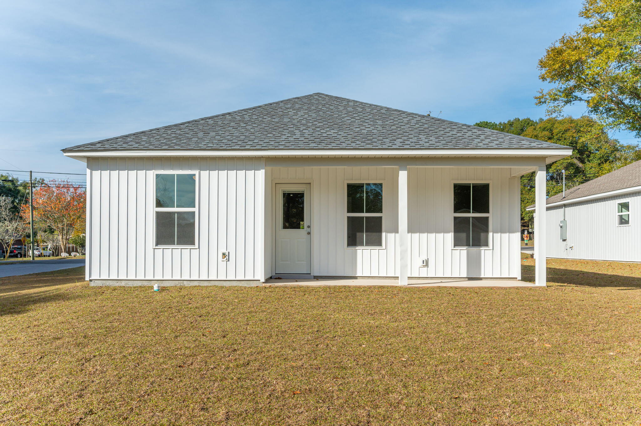 1000 Valley Road Crestview, FL 32539 - Photo 27 of 30 a front view of a house with large windows and plants