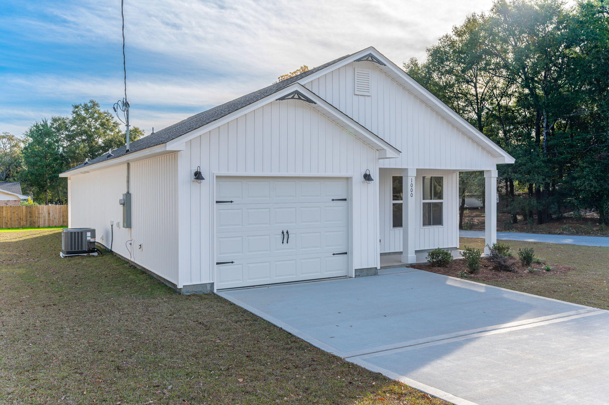 1000 Valley Road Crestview, FL 32539 - Photo 3 of 30 a view of a house with a yard and garage