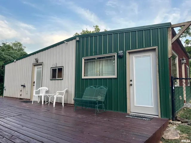 a front view of a house with balcony