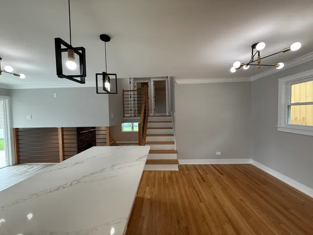 a view of a livingroom with wooden floor