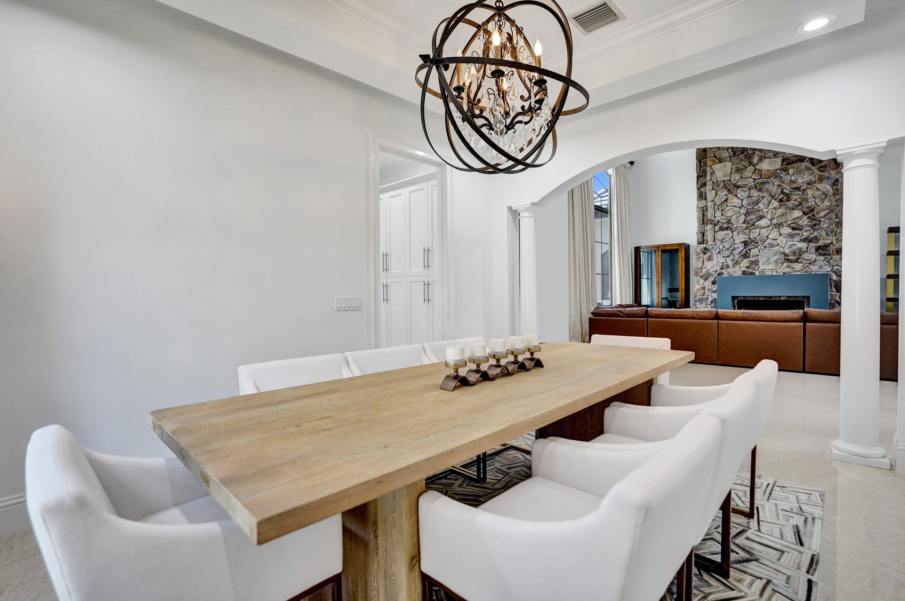 9210 Equus Circle Boynton Beach, FL 33472 - Photo 12 of 75 a view of a dining area in a hall
