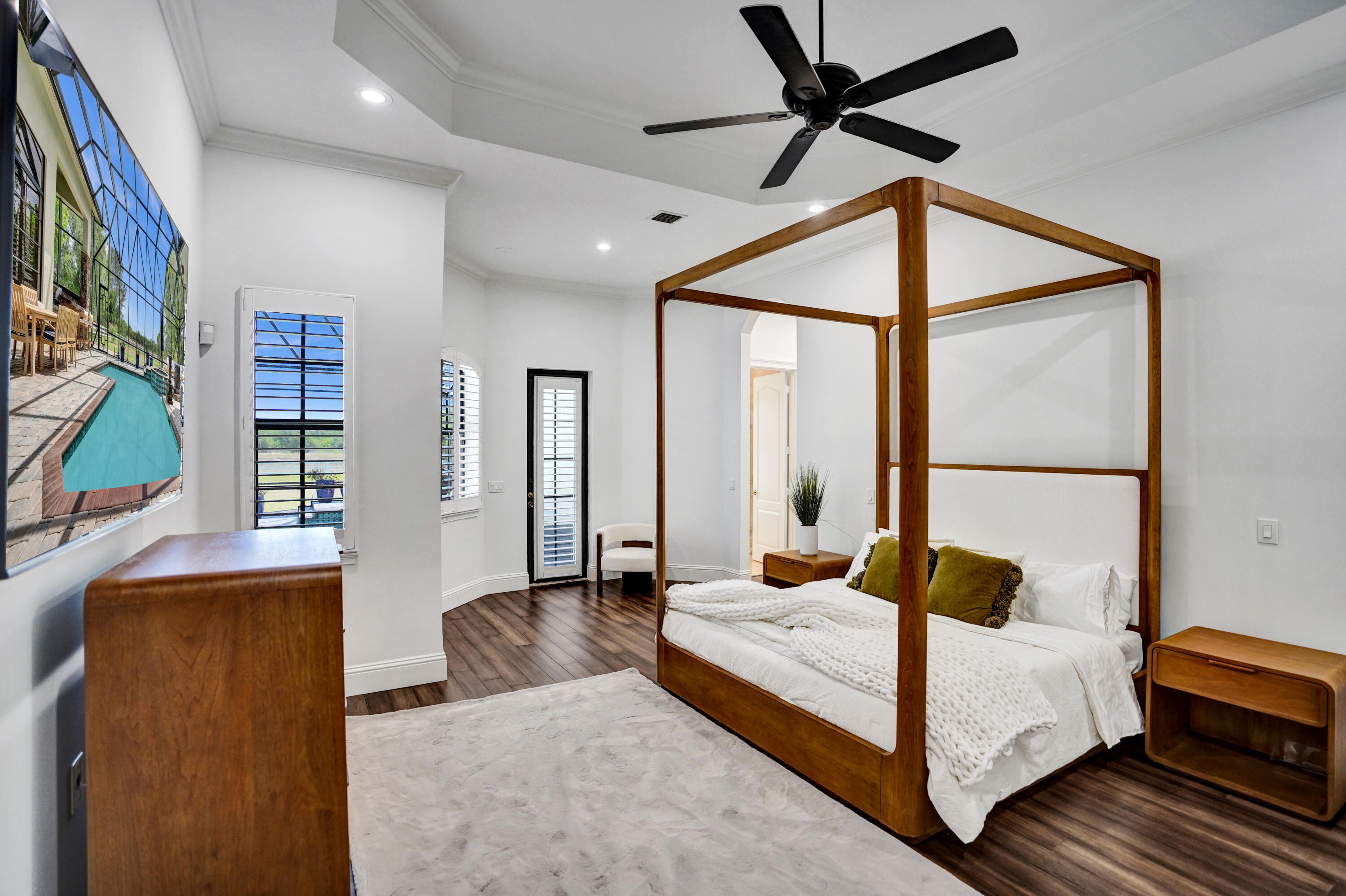 9210 Equus Circle Boynton Beach, FL 33472 - Photo 23 of 75 a bedroom with a bed couch and a window