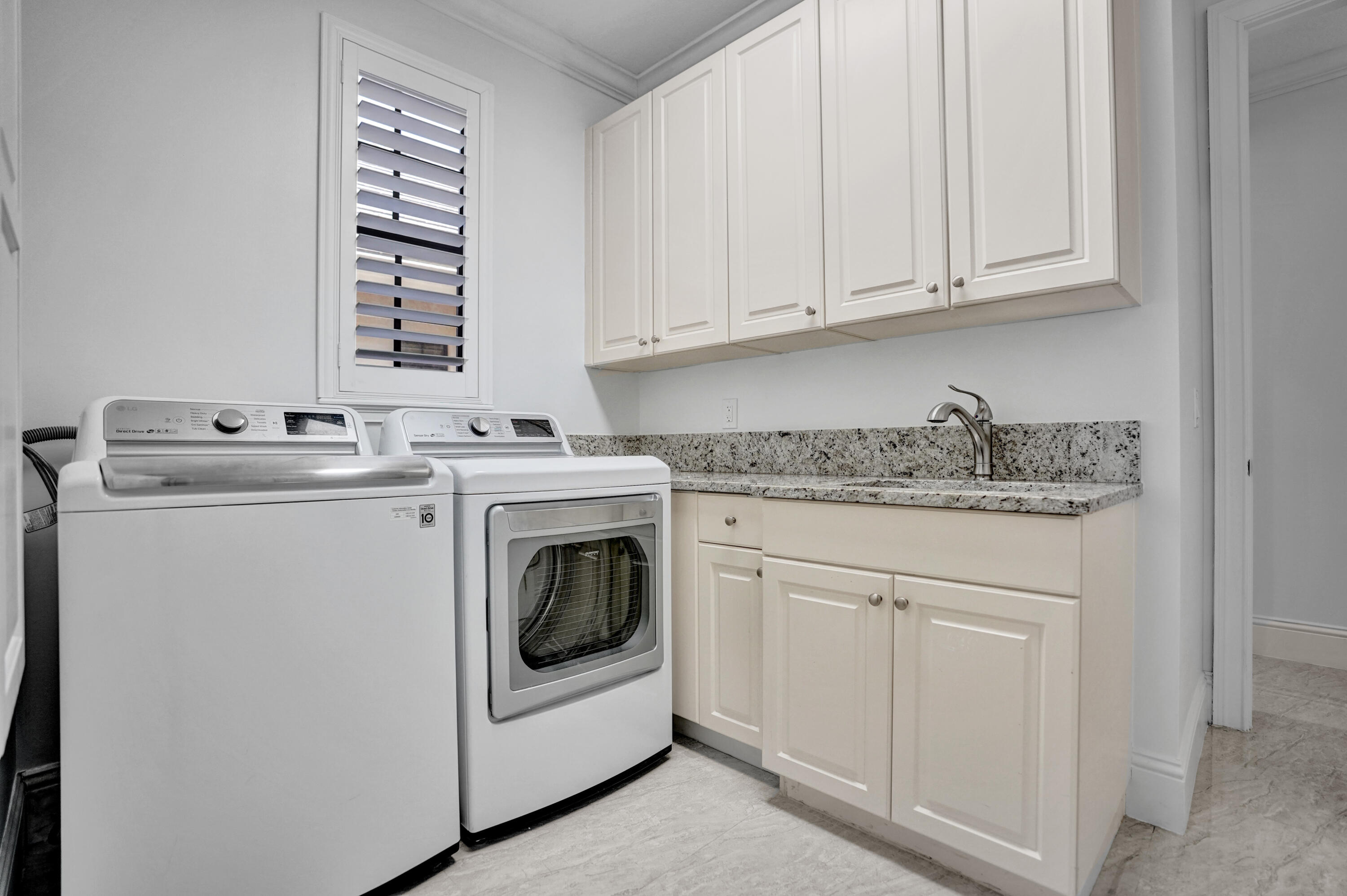 9210 Equus Circle Boynton Beach, FL 33472 - Photo 28 of 75 a utility room with dryer and washer
