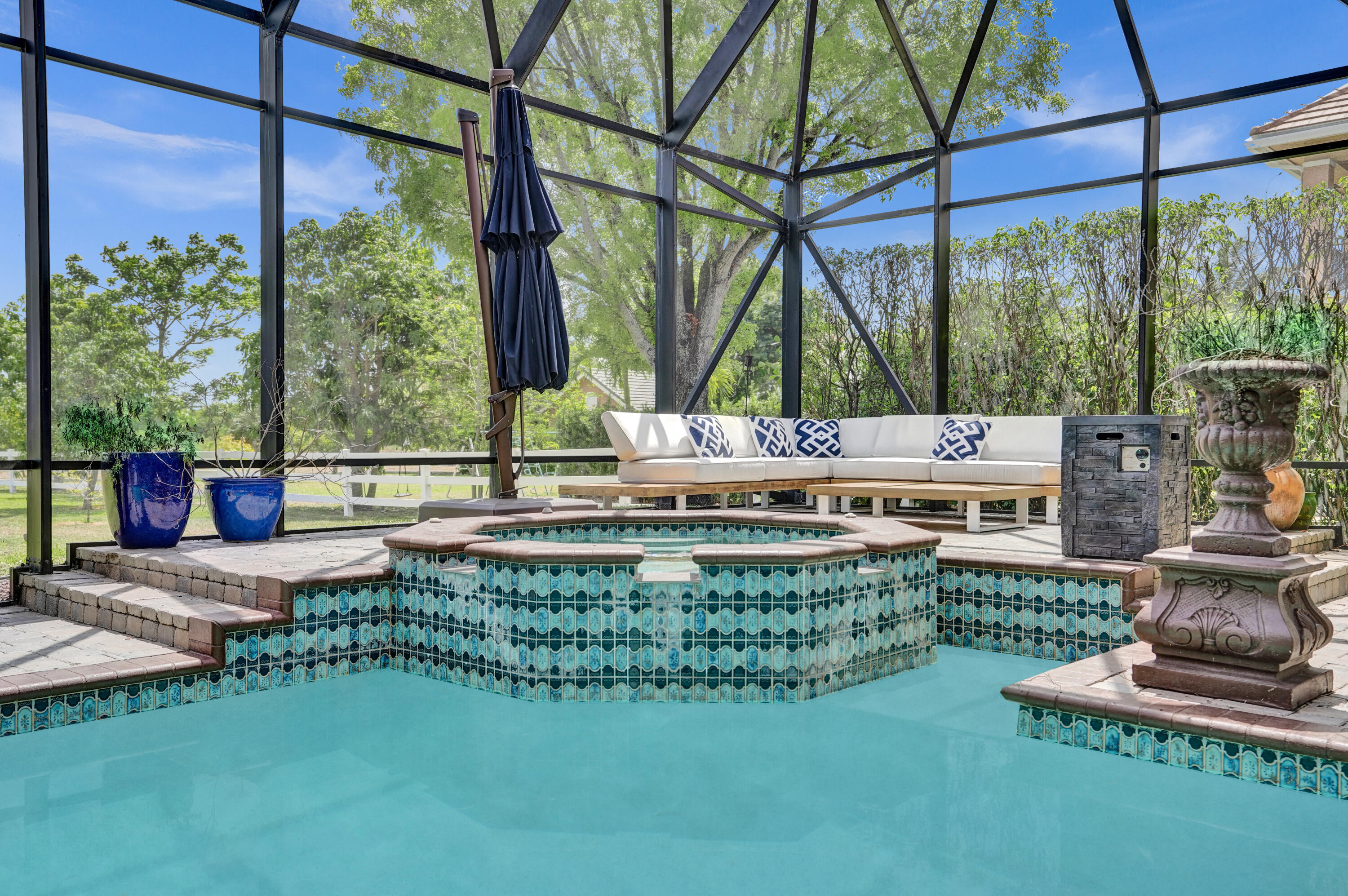 9210 Equus Circle Boynton Beach, FL 33472 - Photo 41 of 75 a living room with furniture and a large window
