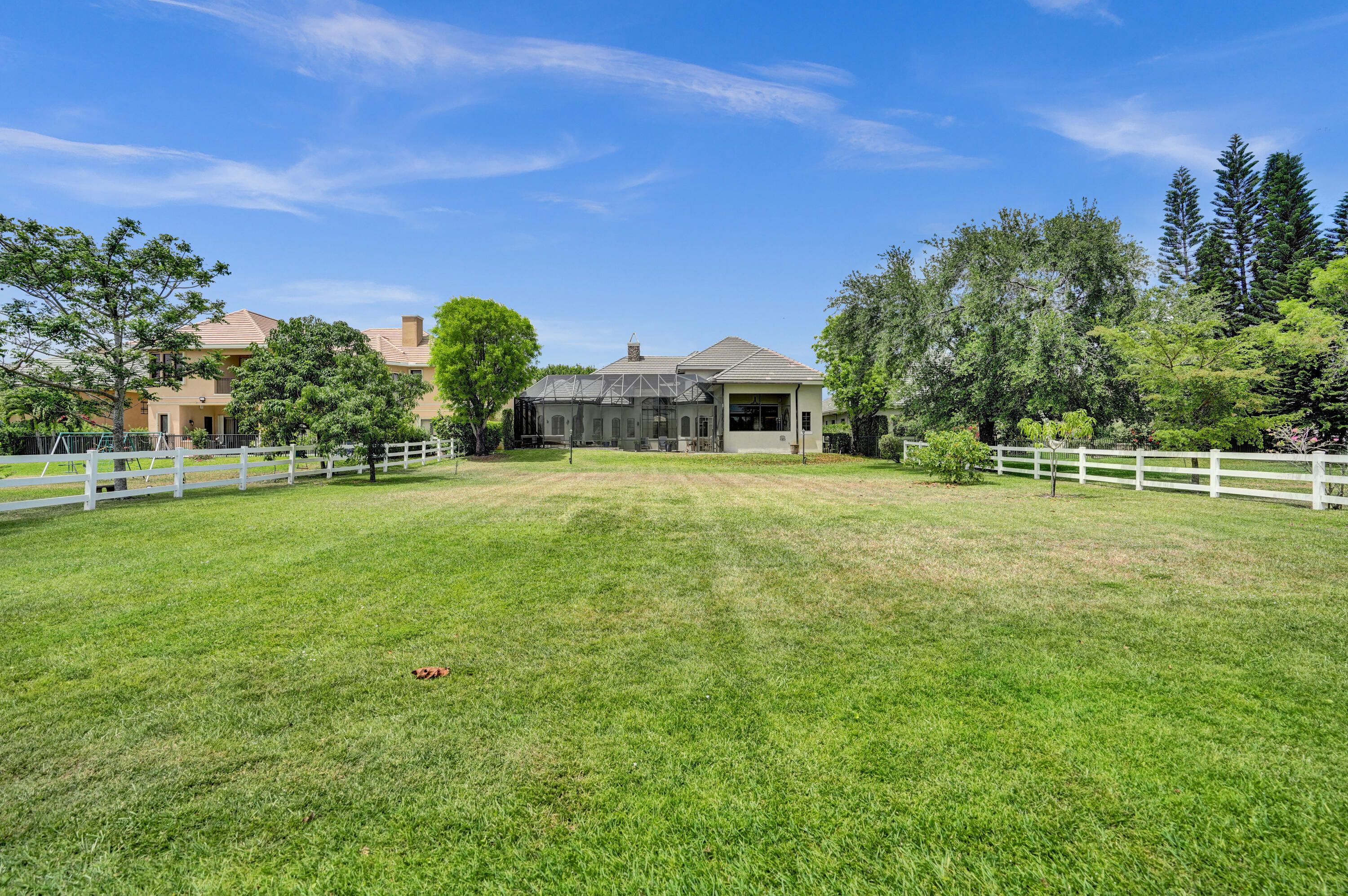 9210 Equus Circle Boynton Beach, FL 33472 - Photo 44 of 75 a view of a house with a big yard
