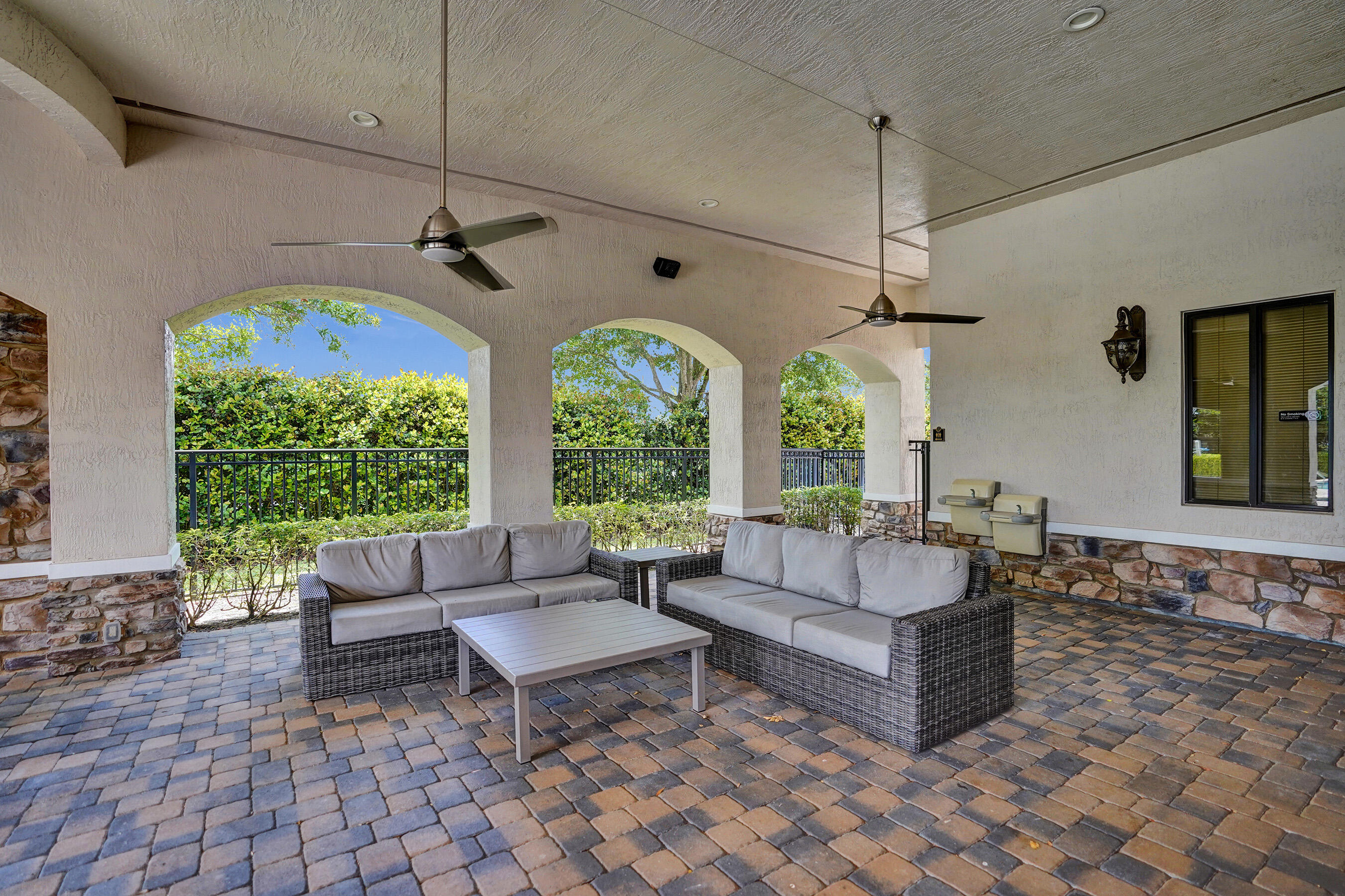 9210 Equus Circle Boynton Beach, FL 33472 - Photo 62 of 75 a living room with patio furniture and a large window