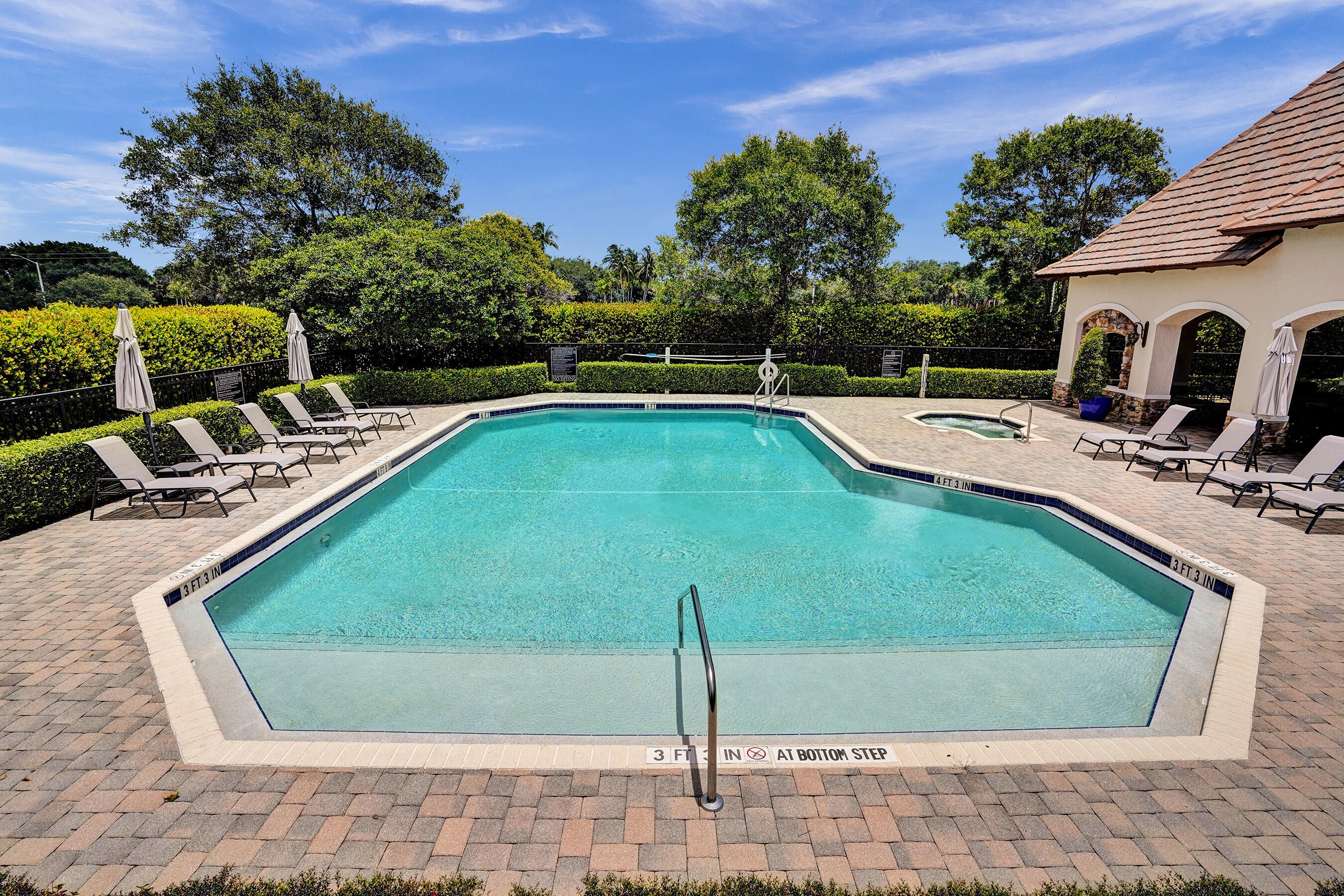 9210 Equus Circle Boynton Beach, FL 33472 - Photo 65 of 75 a view of a swimming pool with a yard and sitting area