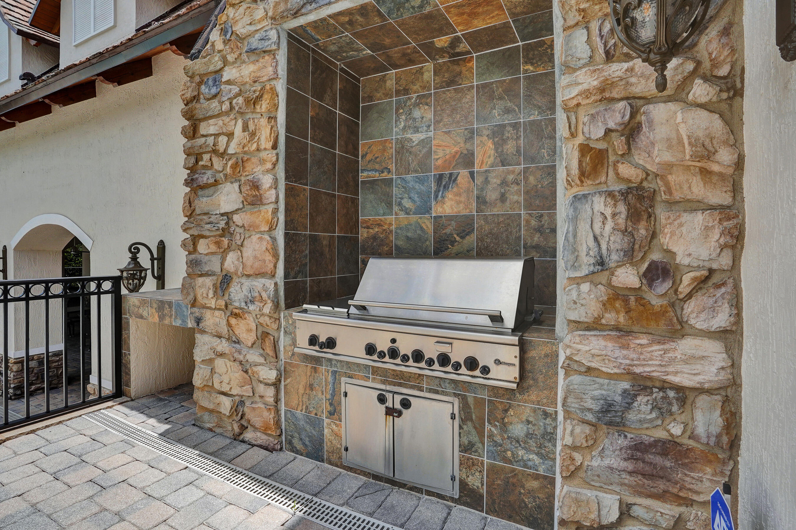 9210 Equus Circle Boynton Beach, FL 33472 - Photo 66 of 75 a stove top oven sitting inside of a kitchen