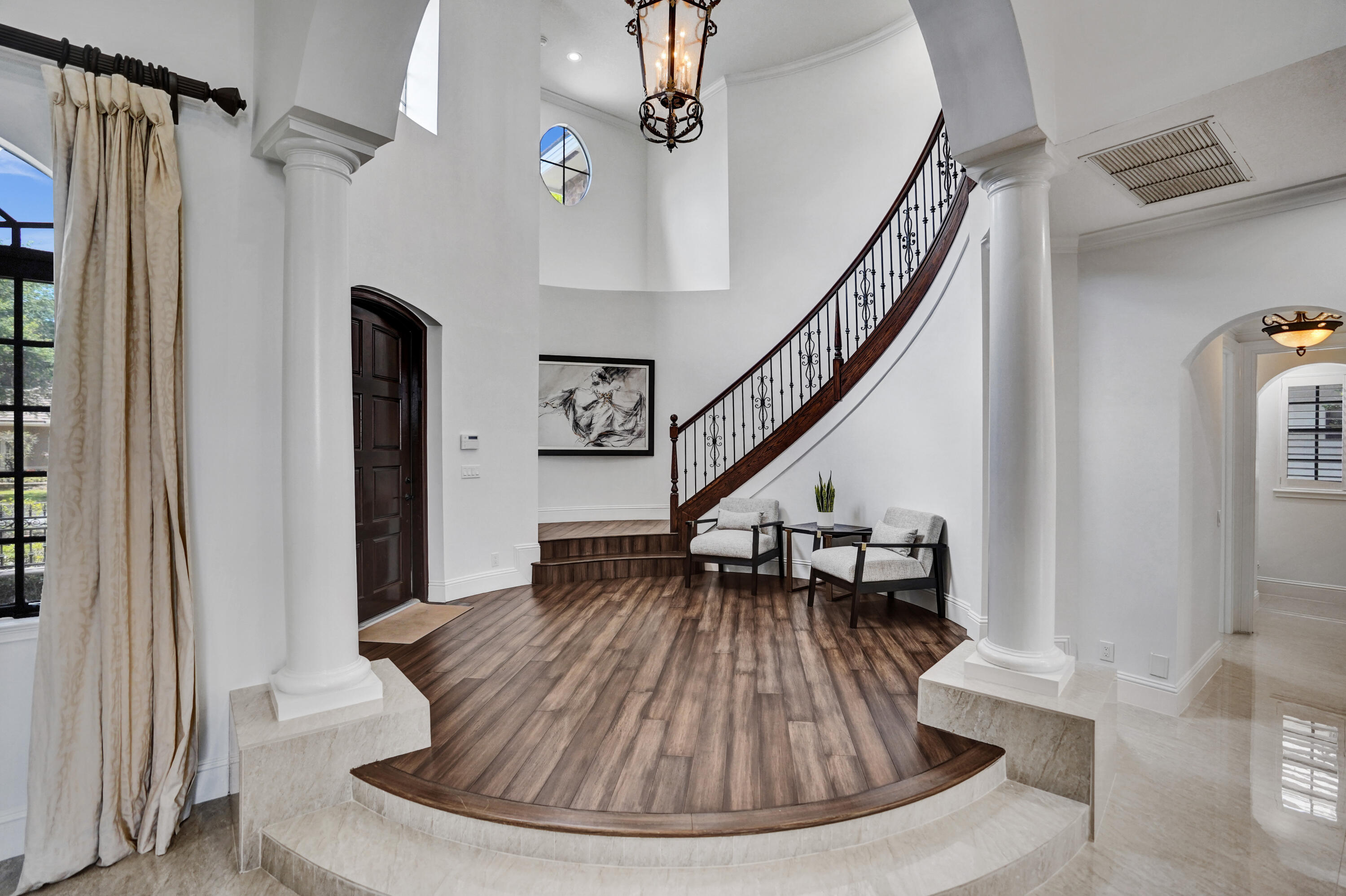 9210 Equus Circle Boynton Beach, FL 33472 - Photo 7 of 75 a view of entryway and hall with wooden floor