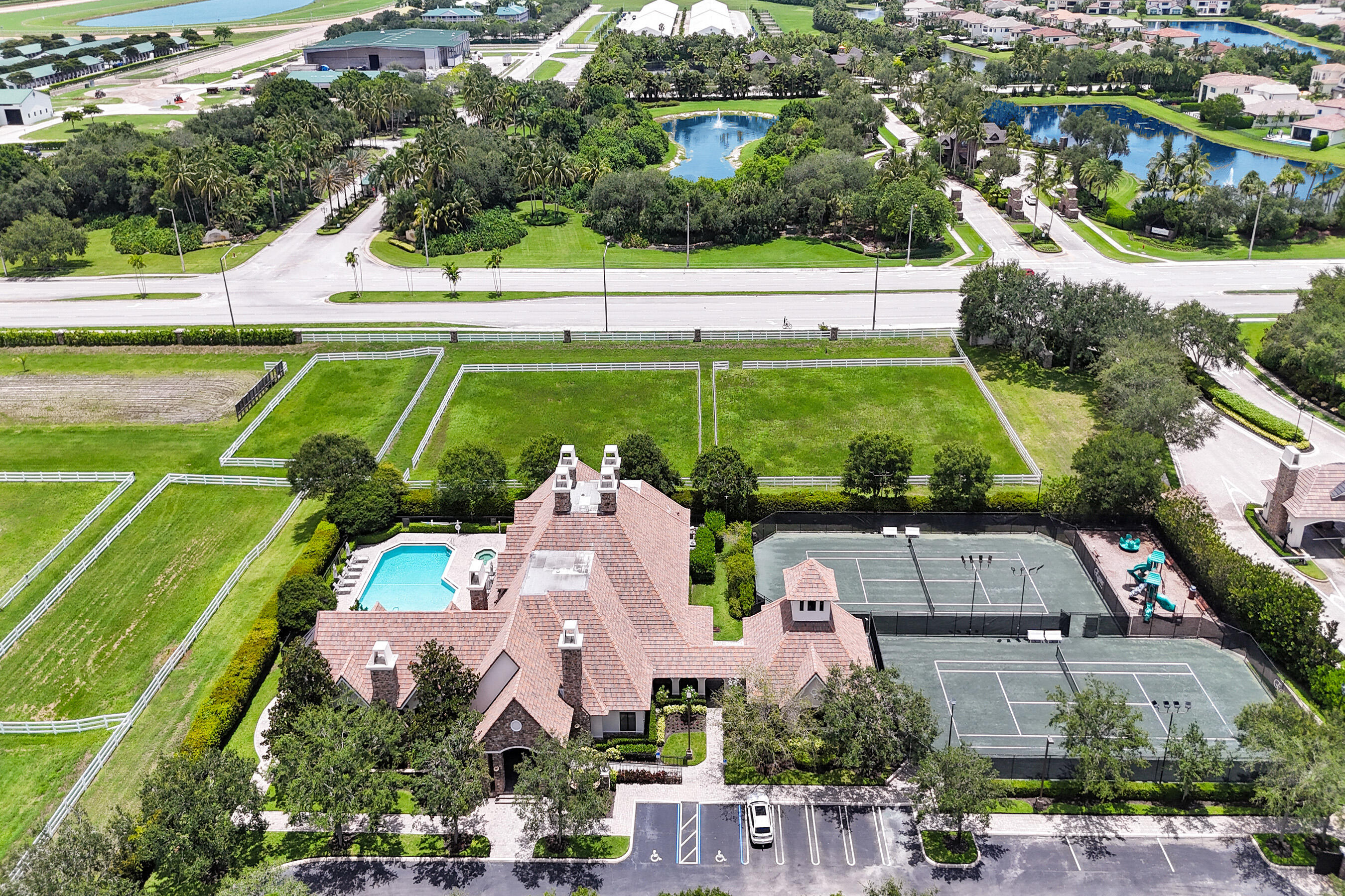 9210 Equus Circle Boynton Beach, FL 33472 - Photo 73 of 75 an aerial view of a house with a swimming pool yard and outdoor seating