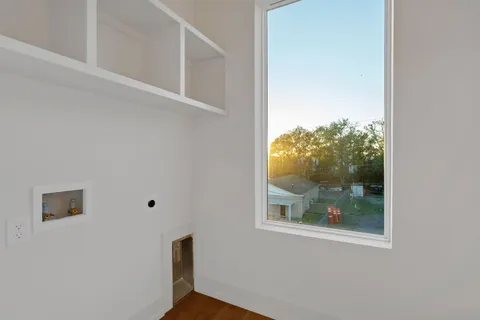 a bathroom with a shower sink and mirror