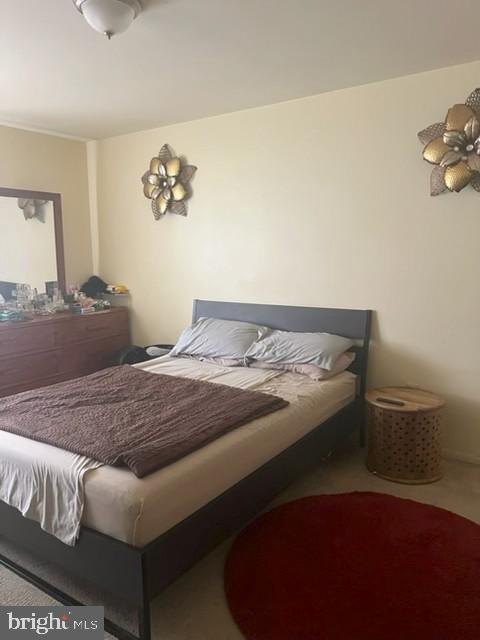 109 Swiss Gap Road, Unit 41 Upper Marlboro, MD 20774 - Photo 3 of 11 a bedroom with a bed and a couch