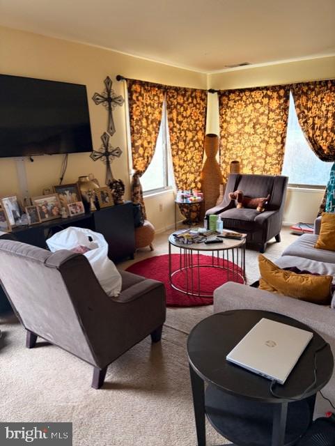 109 Swiss Gap Road, Unit 41 Upper Marlboro, MD 20774 - Photo 4 of 11 a living room with furniture and a large window