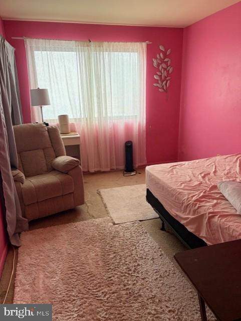 109 Swiss Gap Road, Unit 41 Upper Marlboro, MD 20774 - Photo 9 of 11 a bedroom with a bed and a couch