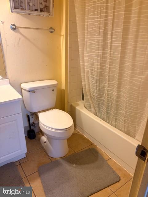 109 Swiss Gap Road, Unit 41 Upper Marlboro, MD 20774 - Photo 10 of 11 a white toilet sitting next to a bath tub and a shower