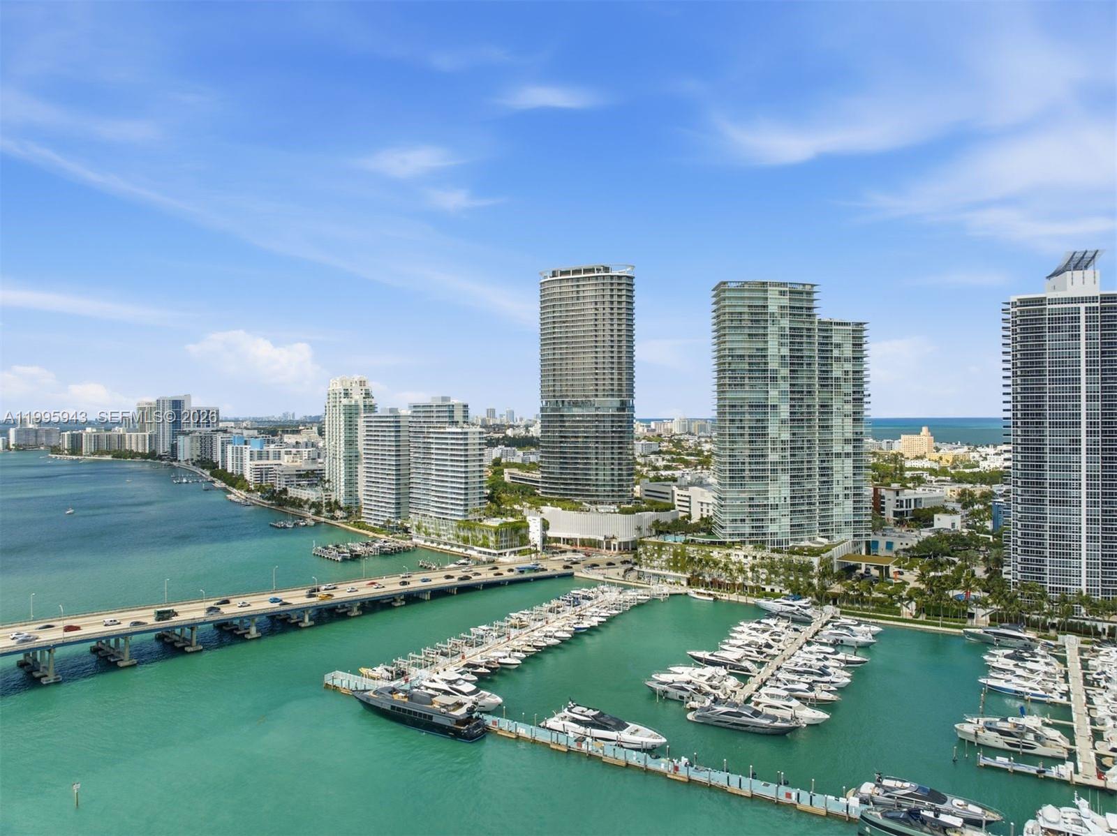 450 Alton Road, Unit 910 Miami Beach, FL 33139 - Photo 41 of 59 a view of a city with tall buildings and a big yard