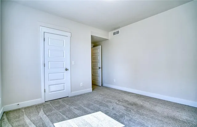 an empty room with closet