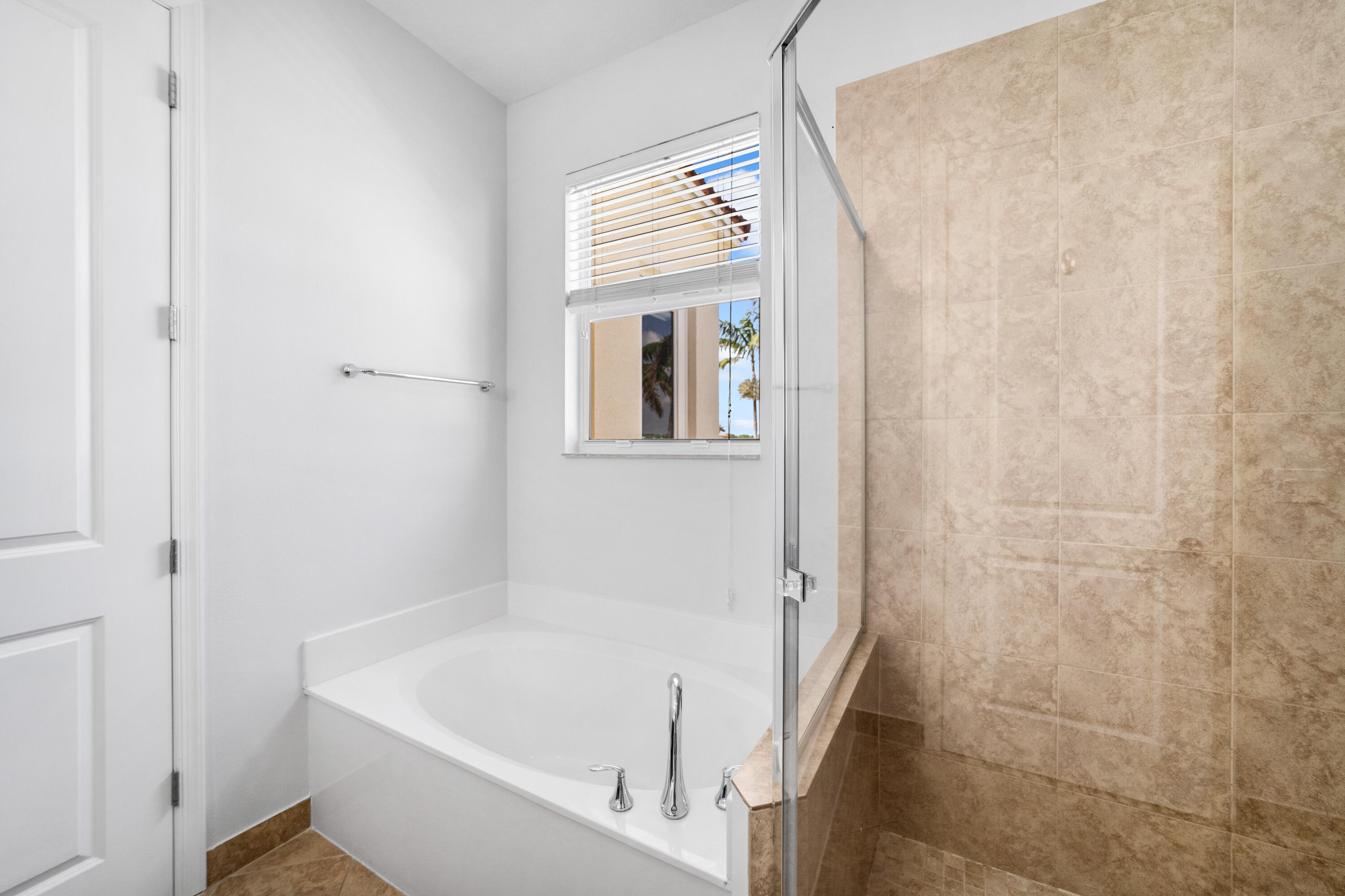 1430 Northwest 48th Lane Boca Raton, FL 33431 - Photo 24 of 54 a bathroom with a bathtub and a shower