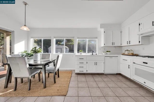a kitchen with a cabinets and appliances