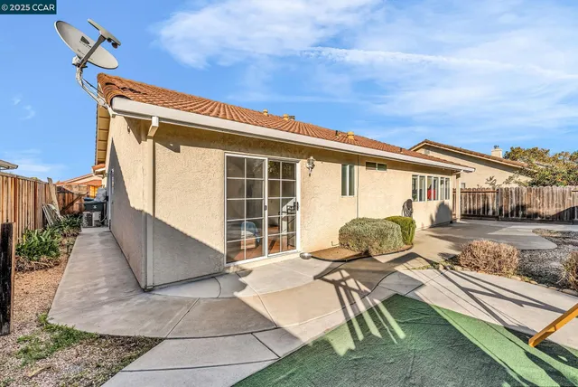 a view of a street with a building in the background