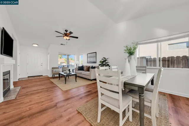 a kitchen with stainless steel appliances a refrigerator sink and cabinets