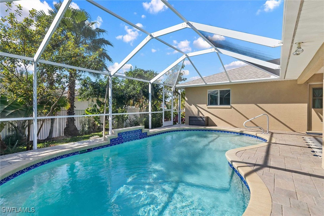 4810 Southwest 25th Place Cape Coral, FL 33914 - Photo 20 of 29 a view of a backyard with sitting area