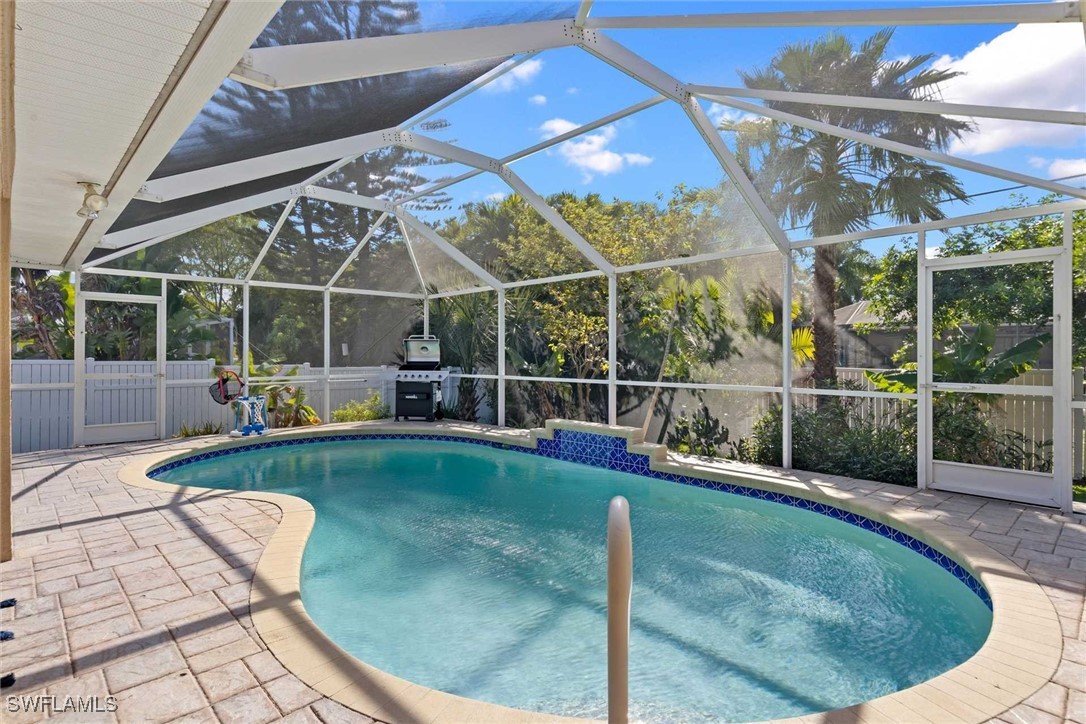 4810 Southwest 25th Place Cape Coral, FL 33914 - Photo 2 of 29 a view of a backyard