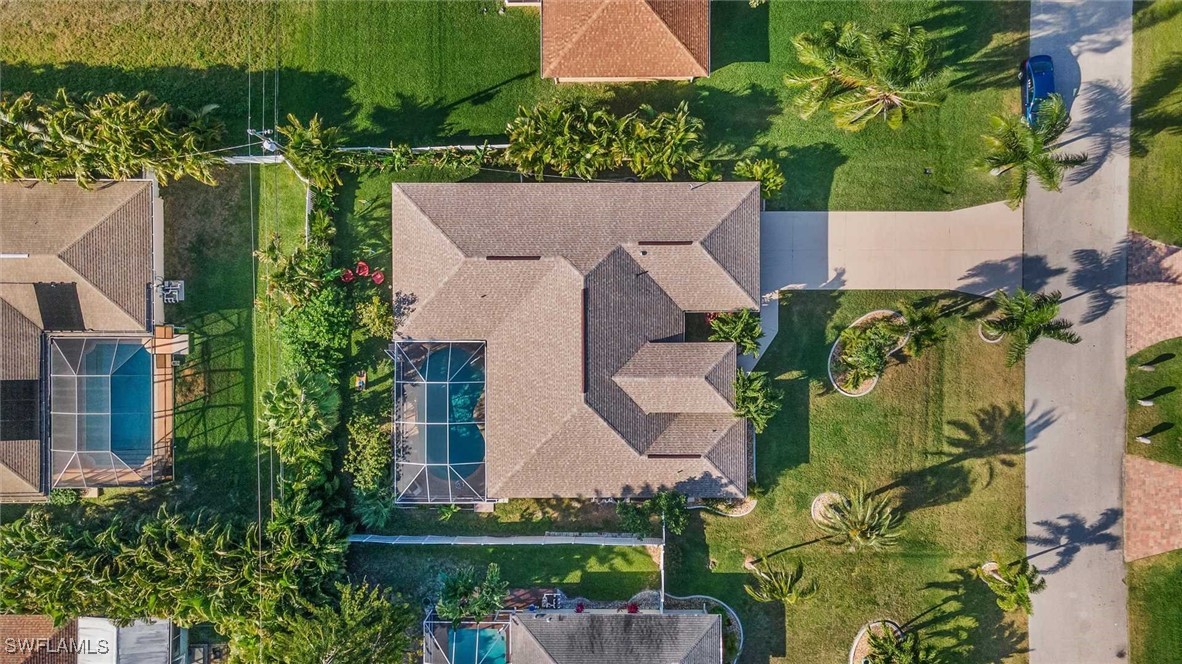 4810 Southwest 25th Place Cape Coral, FL 33914 - Photo 25 of 29 an aerial view of a house